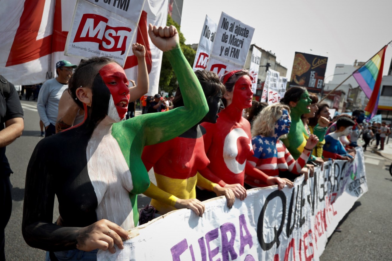 Thousands of anti-G20 protesters have gathered in Buenos Aires as world leaders met for day one of the two-day summit.