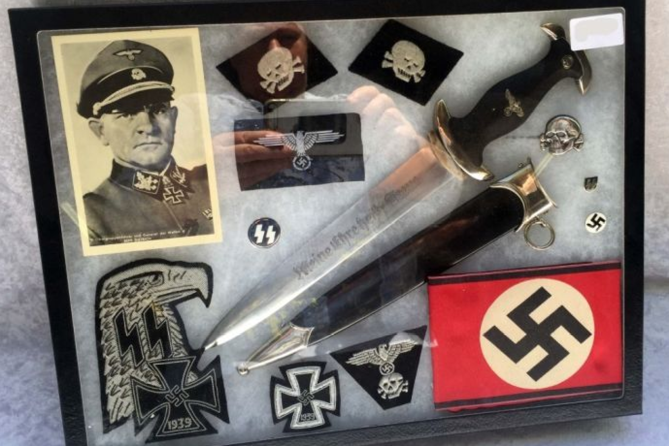 An SS dagger dominates this auctioned collection of Third Reich artefacts 