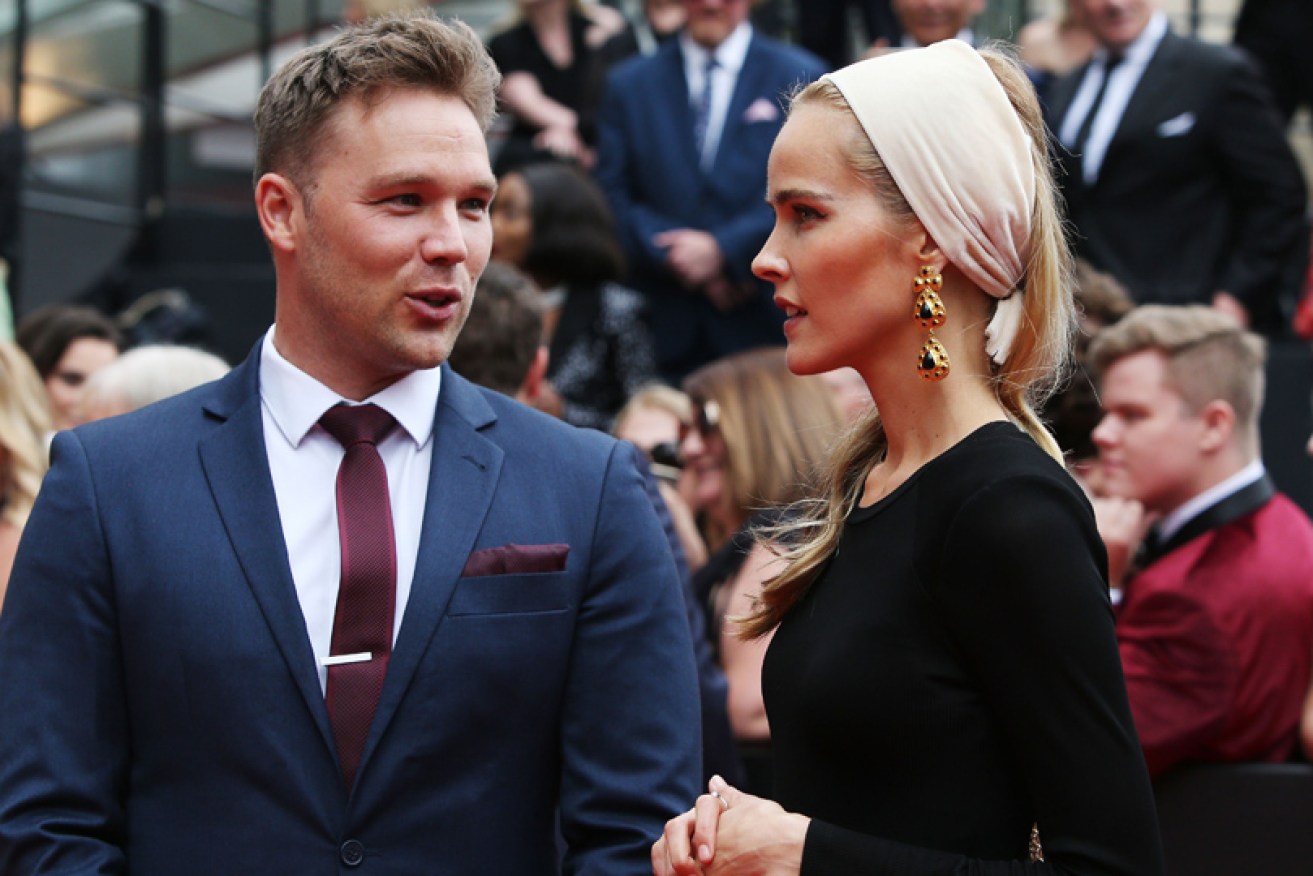 Former <i>Home and Away</i> stars Lincoln Lewis and Isabel Lucas caught up on the AACTAs red carpet in Sydney on December 5.