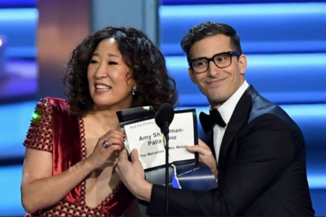 Sandra Oh and Andy Samberg work their chemistry at the Emmys in September.