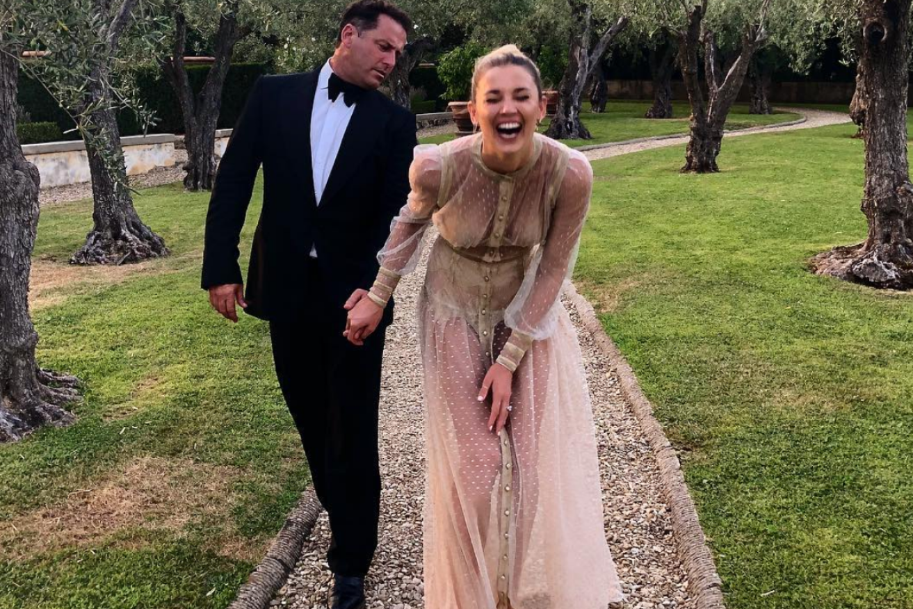 Black tie rehearsal? Karl Stefanovic checks out Jasmine Yarbrough at a friend's party in July.