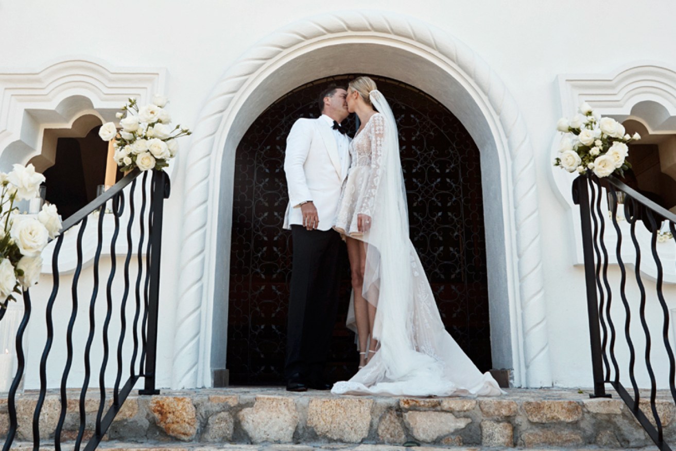 The couple exchanged vows on the stairs of a chapel in Cabo, Mexico.