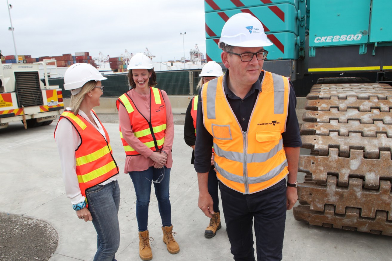 Daniel Andrews and Transport Minister Jacinta Allen (left) tour the West Gate Tunnel site on Sunday.