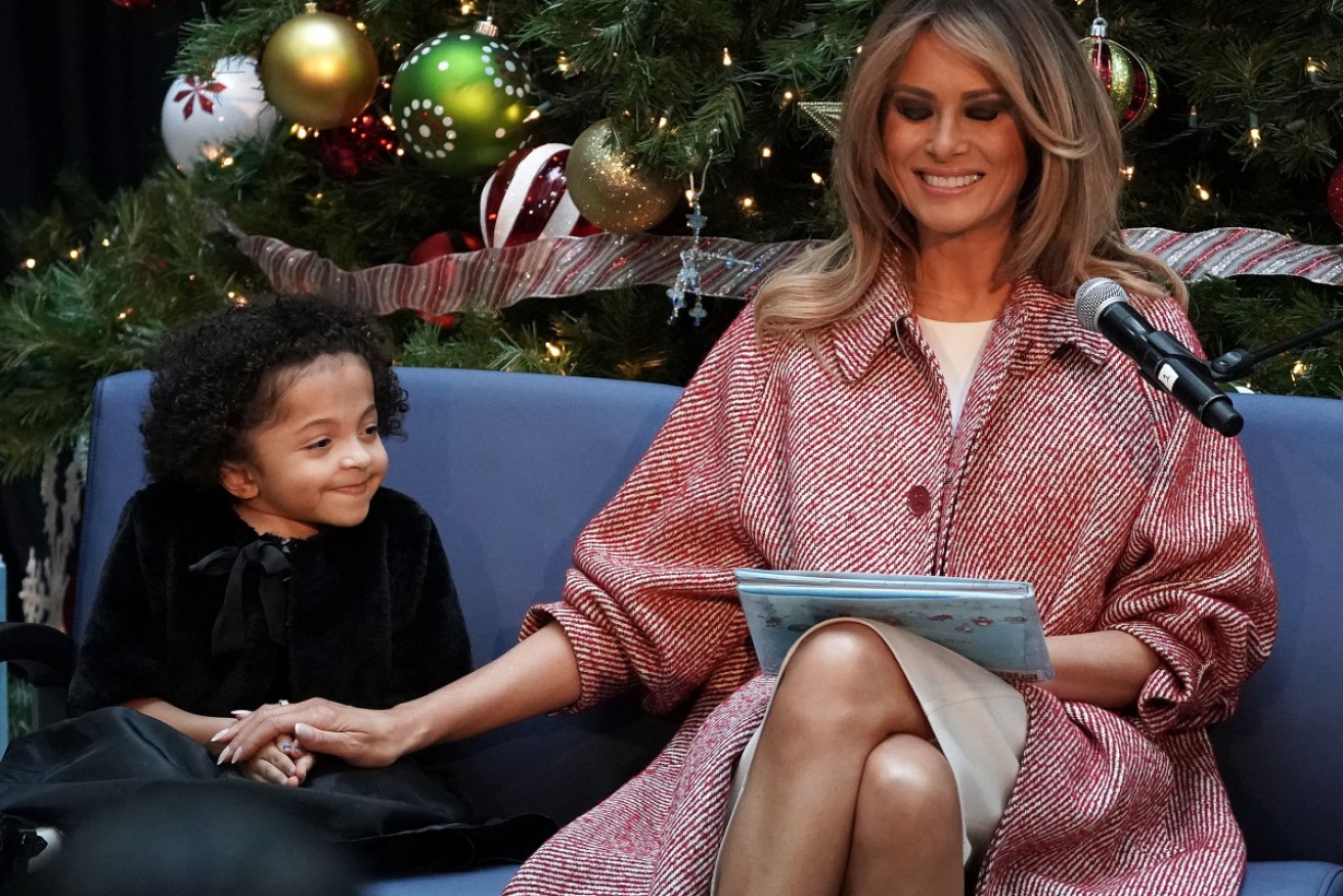 US First Lady Melania Trump reads at the Children's National Hospital on Dec. 13 in Washington DC.