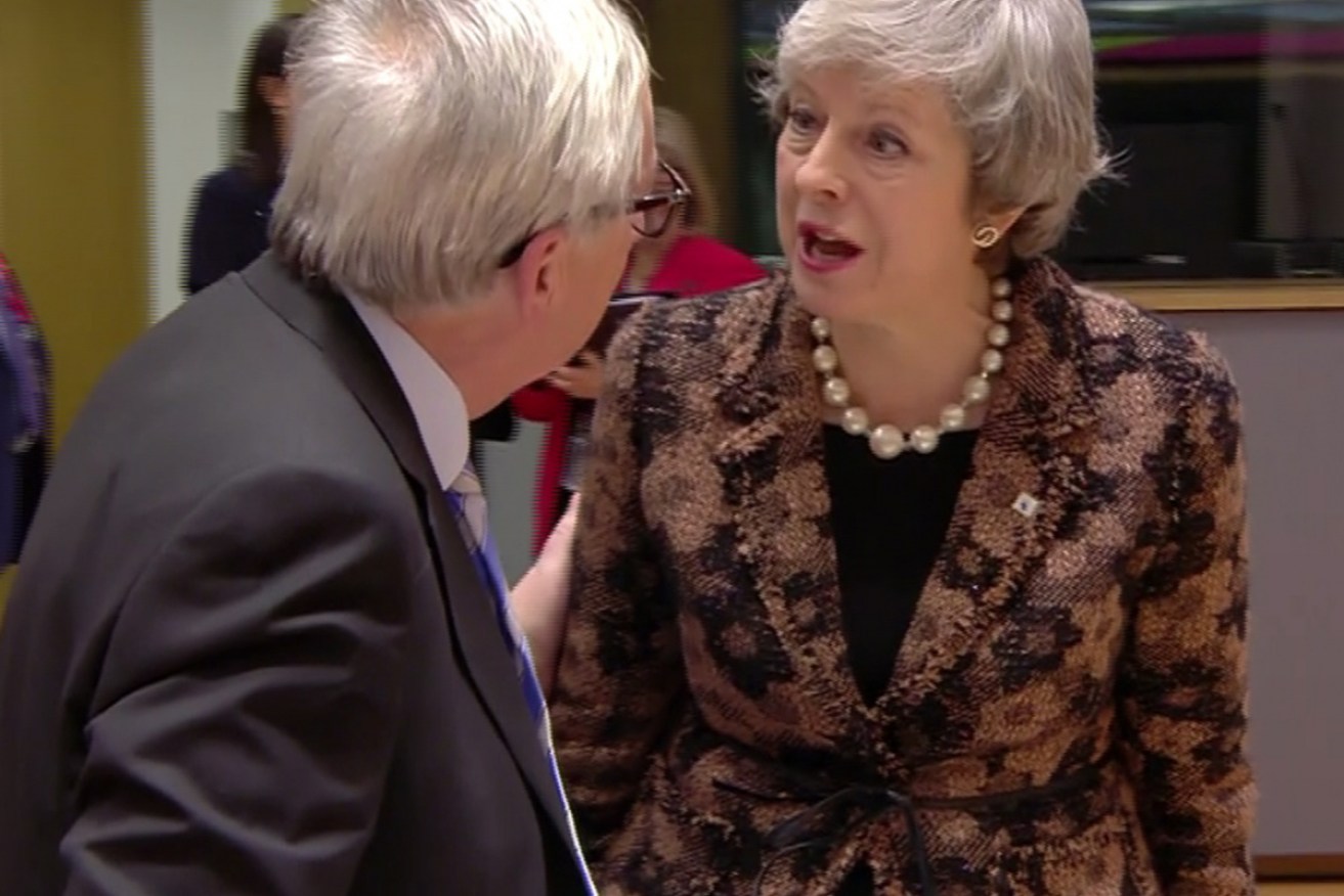 The UK press said Ms May was giving the European Commission President Jean-Claude Juncker 'an earful'. 