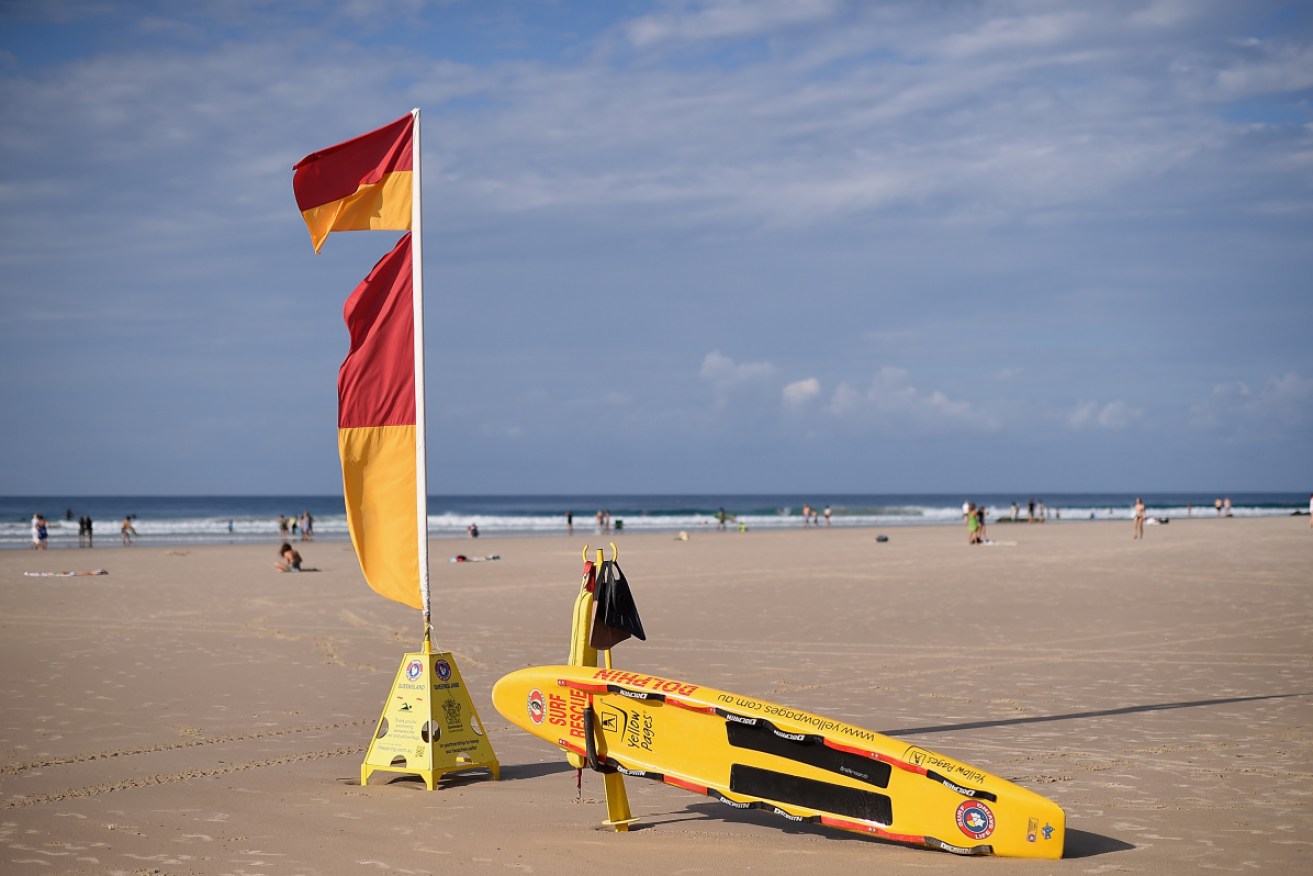 Beachgoers are being urged to swim between the flags on patrolled beaches after two drownings on Tuesday.  