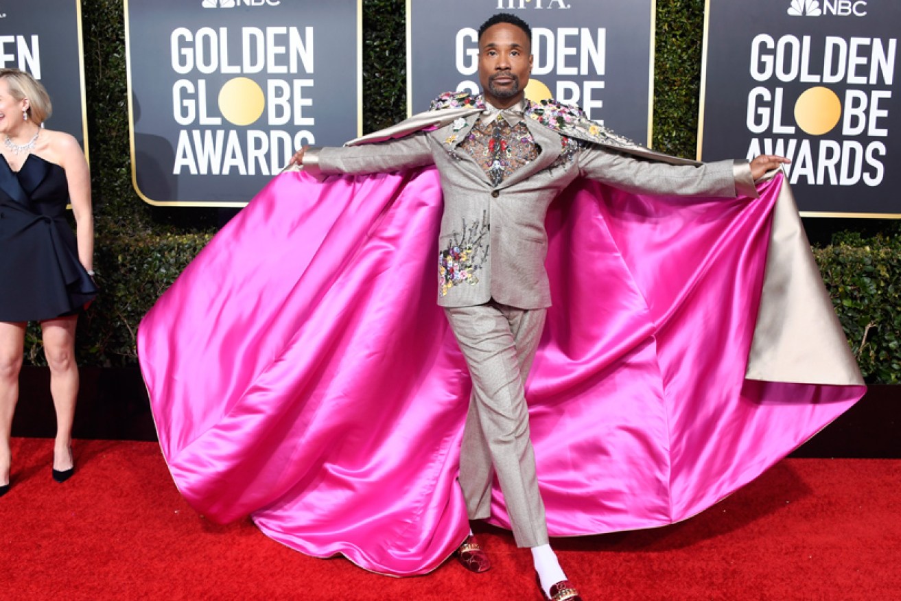 Elisabeth Moss was tickled by nominee Billy Porter in embroidered suit, spangled slippers and cape. Yes, cape.