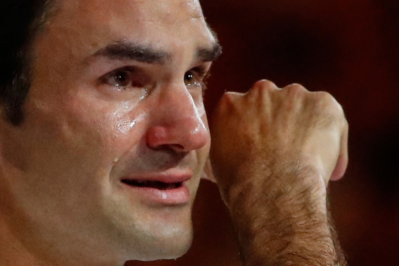 Roger Federer broke down while discussing the emotional resonance of former mentor Peter Carter's passing.