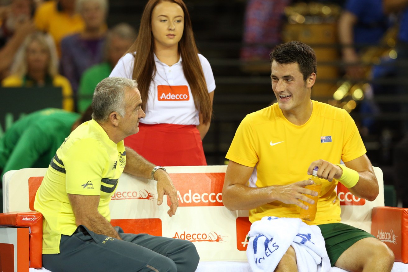 Former Australian Davis Cup captain Wally Masur says the public spat between Bernard Tomic and Lleyton Hewitt needs to be resolved.