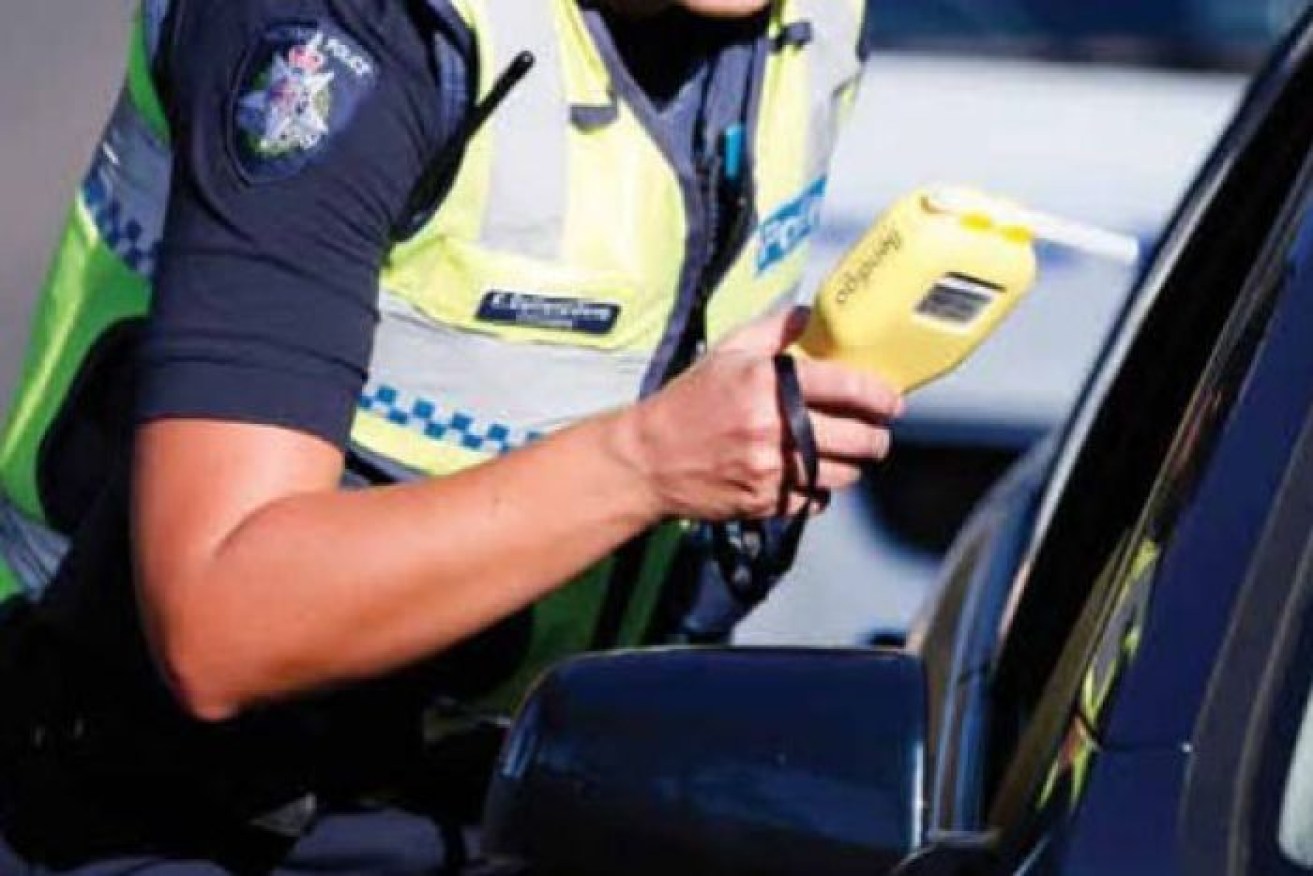 Police were placing a finger over the breath test straw entry hole .