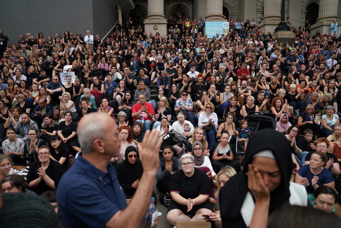 Saeed Maasarwe acknowledges the support of thousands outside Parliament House on January 18.