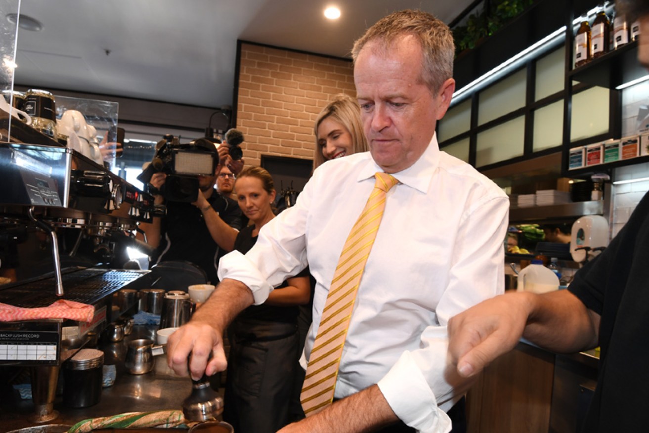 Bill Shorten makes coffee at a Brisbane shopping centre on January 18.