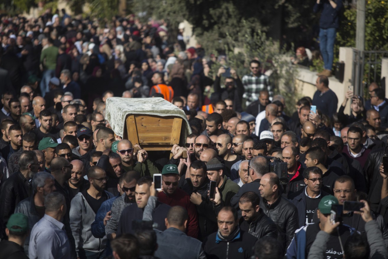 Hundreds of mourners accompanied the murdered woman's coffin. 