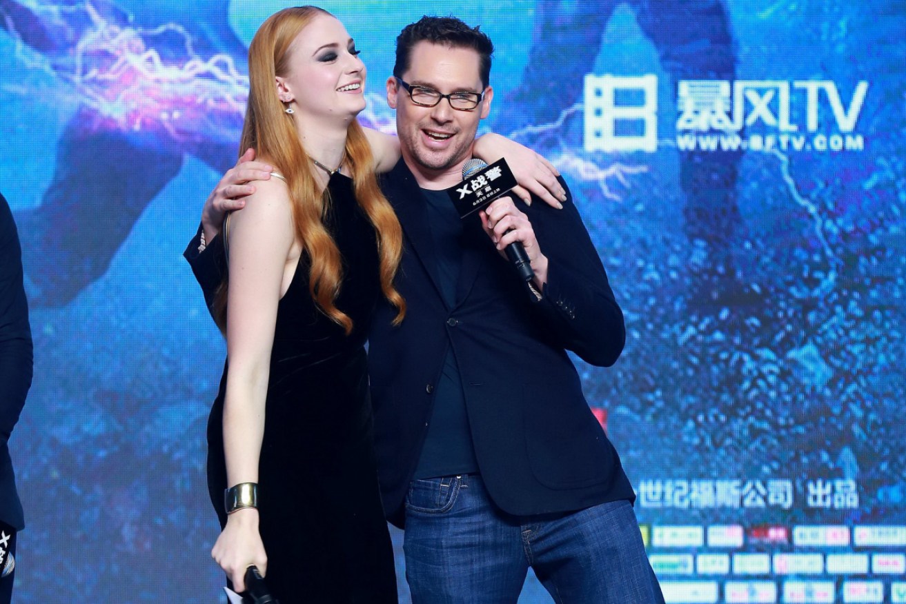 Bryan Singer (with Sophie Turner) promoting <i>X-Men: Apocalypse</i> in Beijing in May 2016.