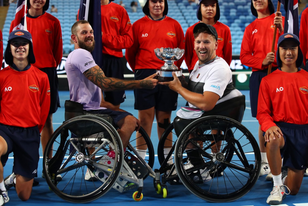 Heath Davidson and Dylan Alcott enjoy their win in the quad wheelchair doubles final. 