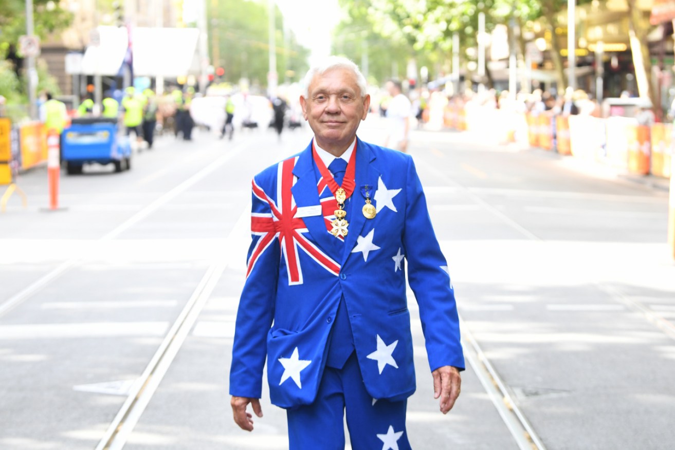 An Australia Day attendee poses for a photograph during the Australia Day celebrations in Melbourne. 