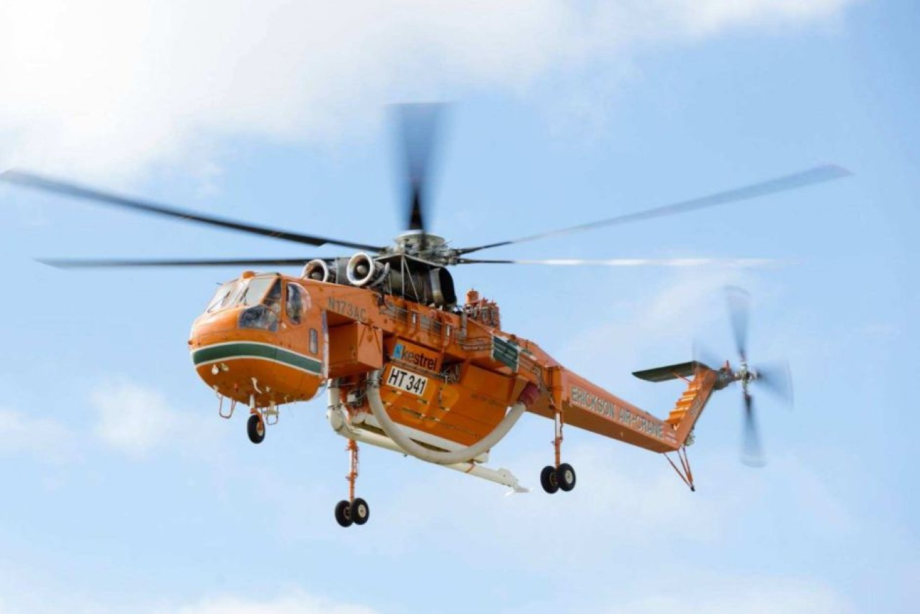 The Aircrane helicopter was attempting to take on water when the crash occurred.
