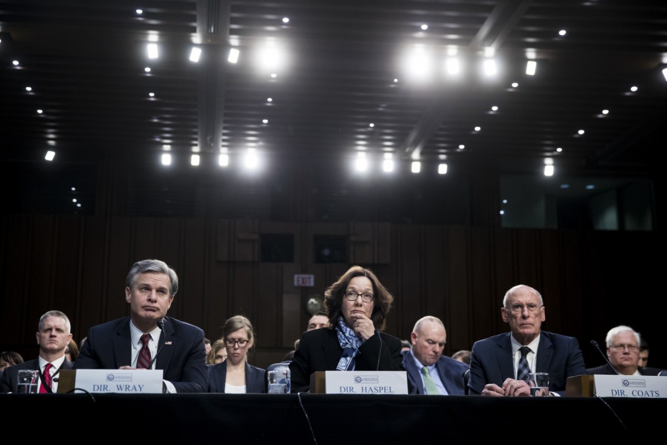 US FBI director Christopher Wray, CIA director Gina Haspel and national intelligence director Dan Coats testify at the intelligence committee hearing. 