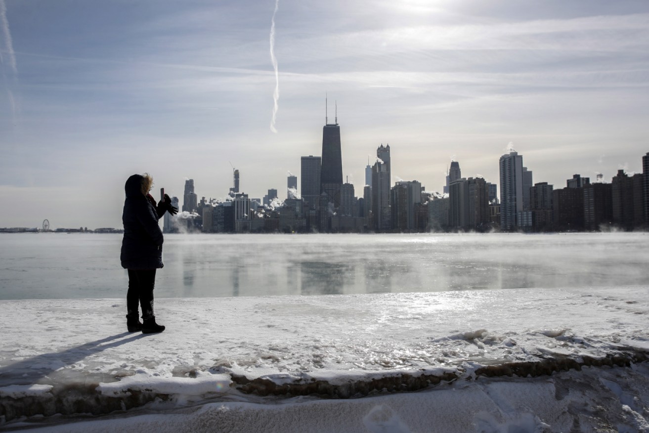 Chicago continues to freeze, as a polar vortex sends temperatures plummeting below minus 40 degrees. 