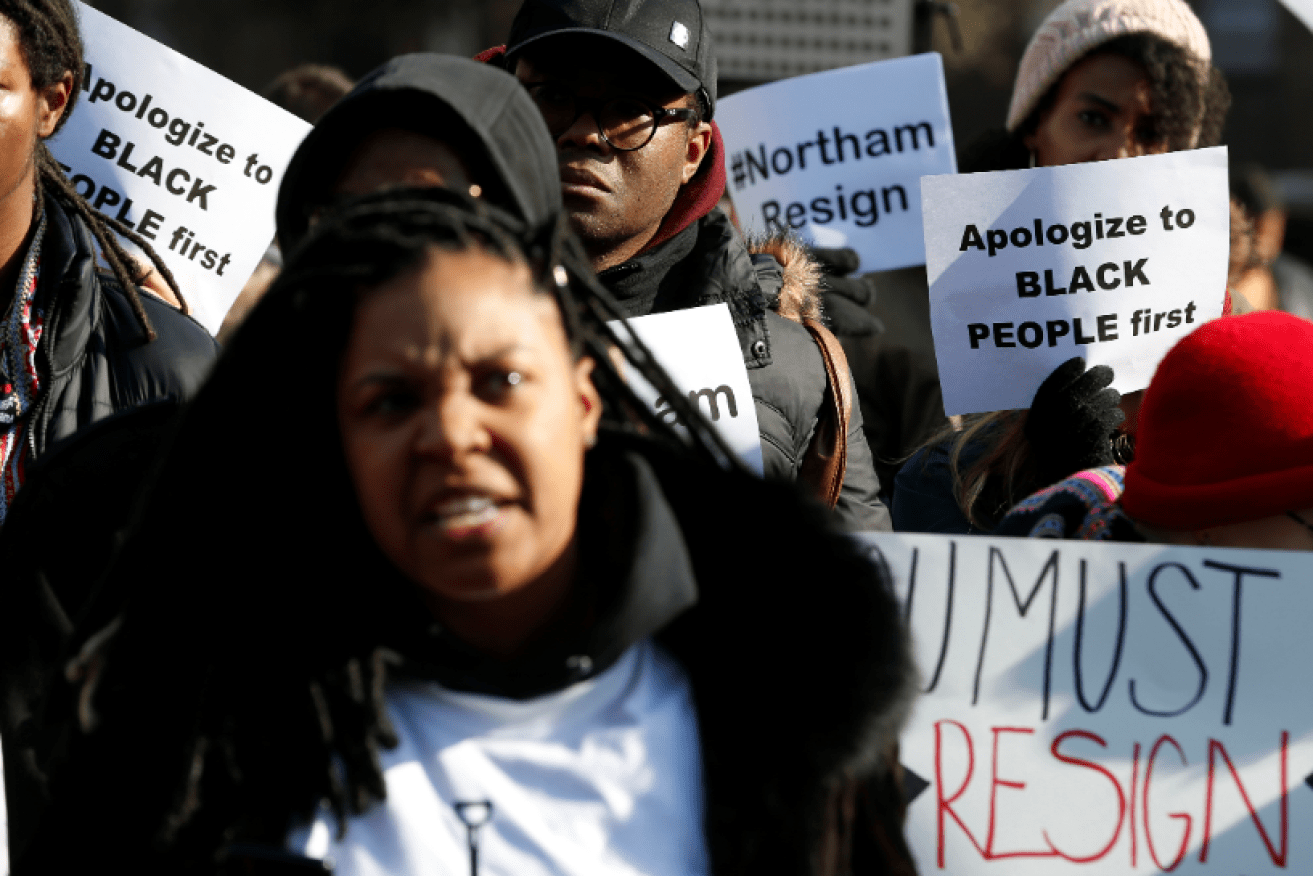 Furious protesters rally outside the Governor's mansion to demand Ralph Northam's resignation.
