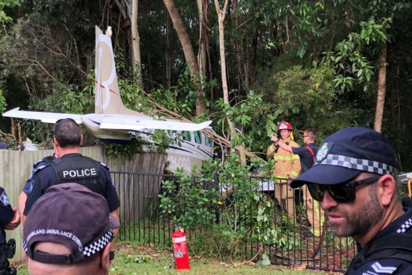 The plane crashed in a backyard. 