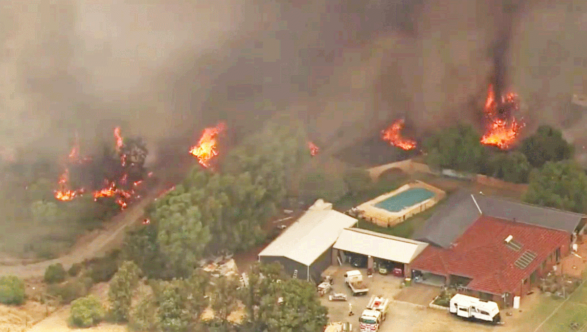 Firefighters are bracing for more strong winds as the fire threatens lives and properties.