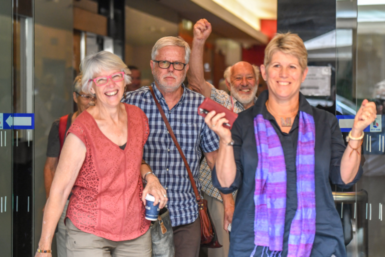 Foes of the Gloucester project are all smiles as they leave court after learning the mine will not be allowed to go ahead.