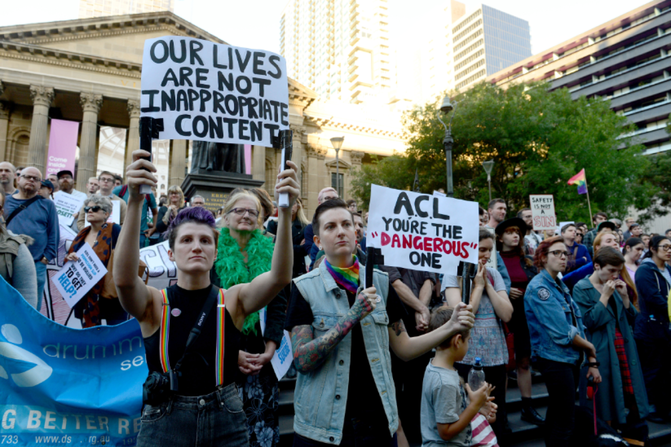 Protesters in Melbourne call on lawmakers to end discrimination against gay students and teachers in religious schools.