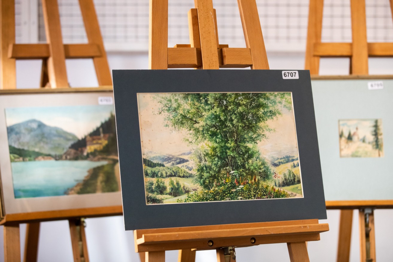 A German auction house initially scrapped the planned sale of 26 artworks attributed to Adolf Hitler.