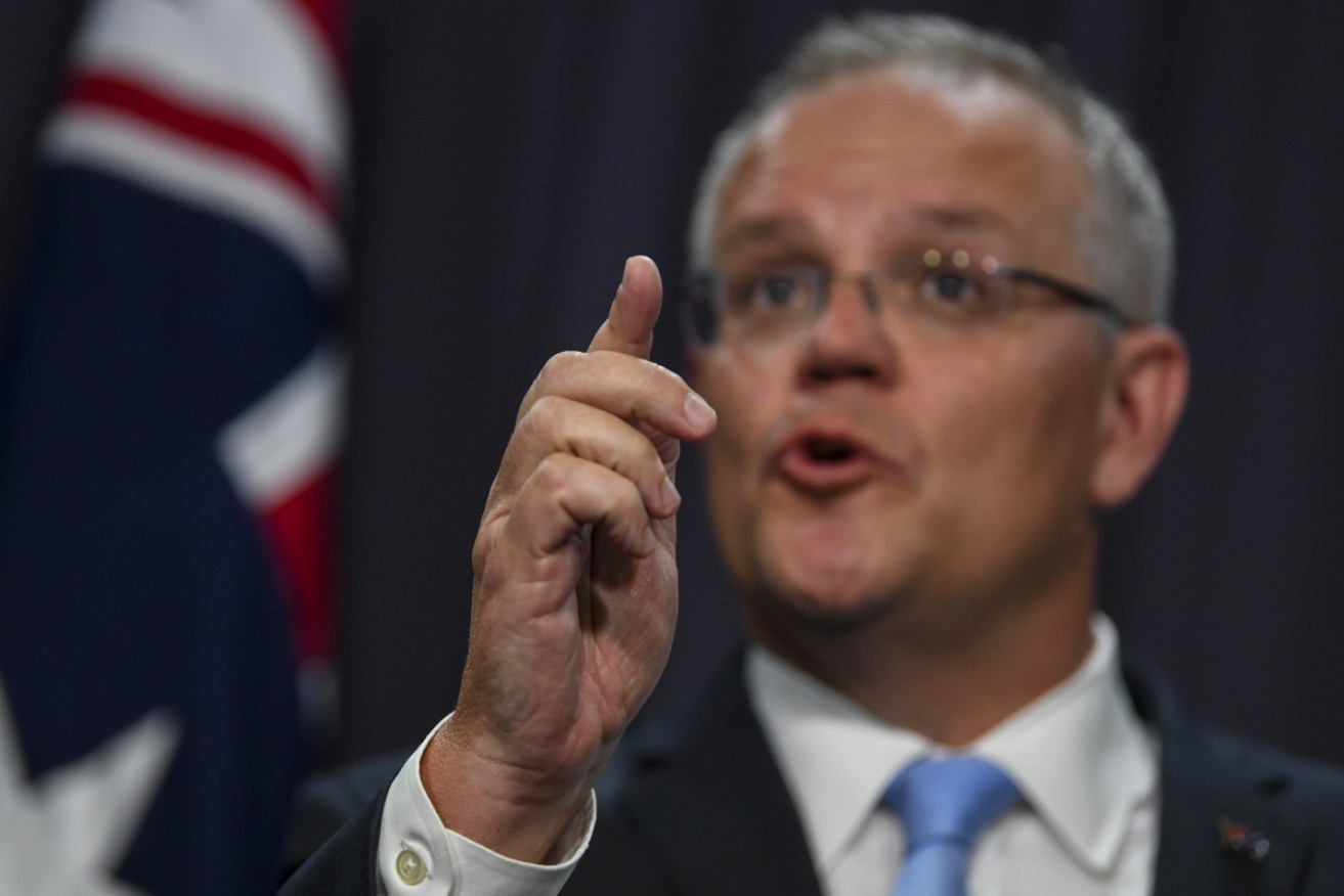 Prime Minister Scott Morrison will reduce the cap by 15 per cent. 