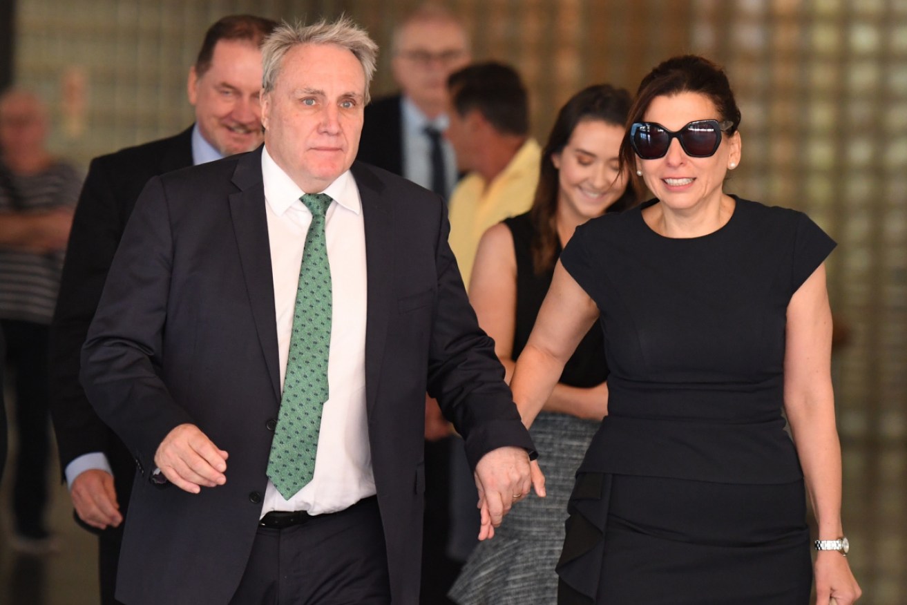 Michael Cranston and his wife Gloria leave the Downing Centre Courts in Sydney on Friday.