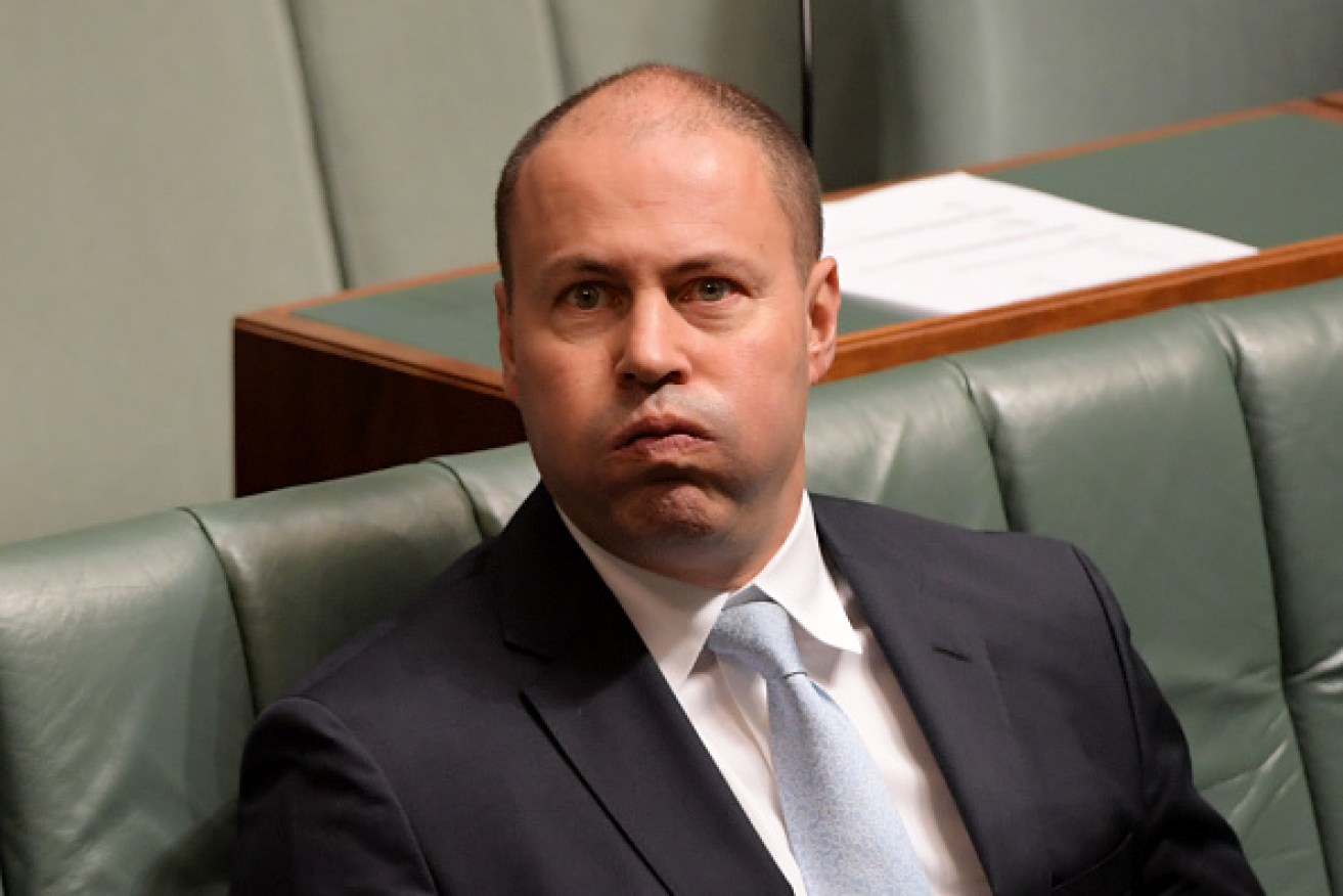 Treasurer Josh Frydenberg has blamed a smaller-than-expected surplus forecast on the drought and international trade tensions.