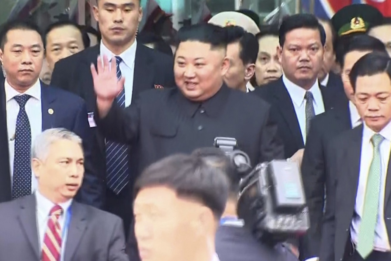 An image from a video shows Kim Jong-un waving upon arriving in the Vietnamese border town of Dong Dang.