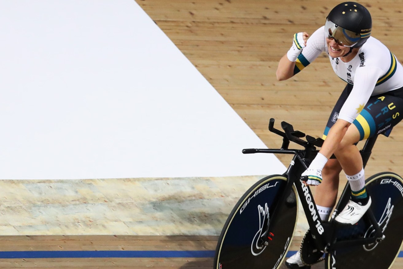 Ashlee Ankudinoff enjoys her women's individual pursuit win at the UCI Track Cycling World Championships in Pruszkow, Poland. 
