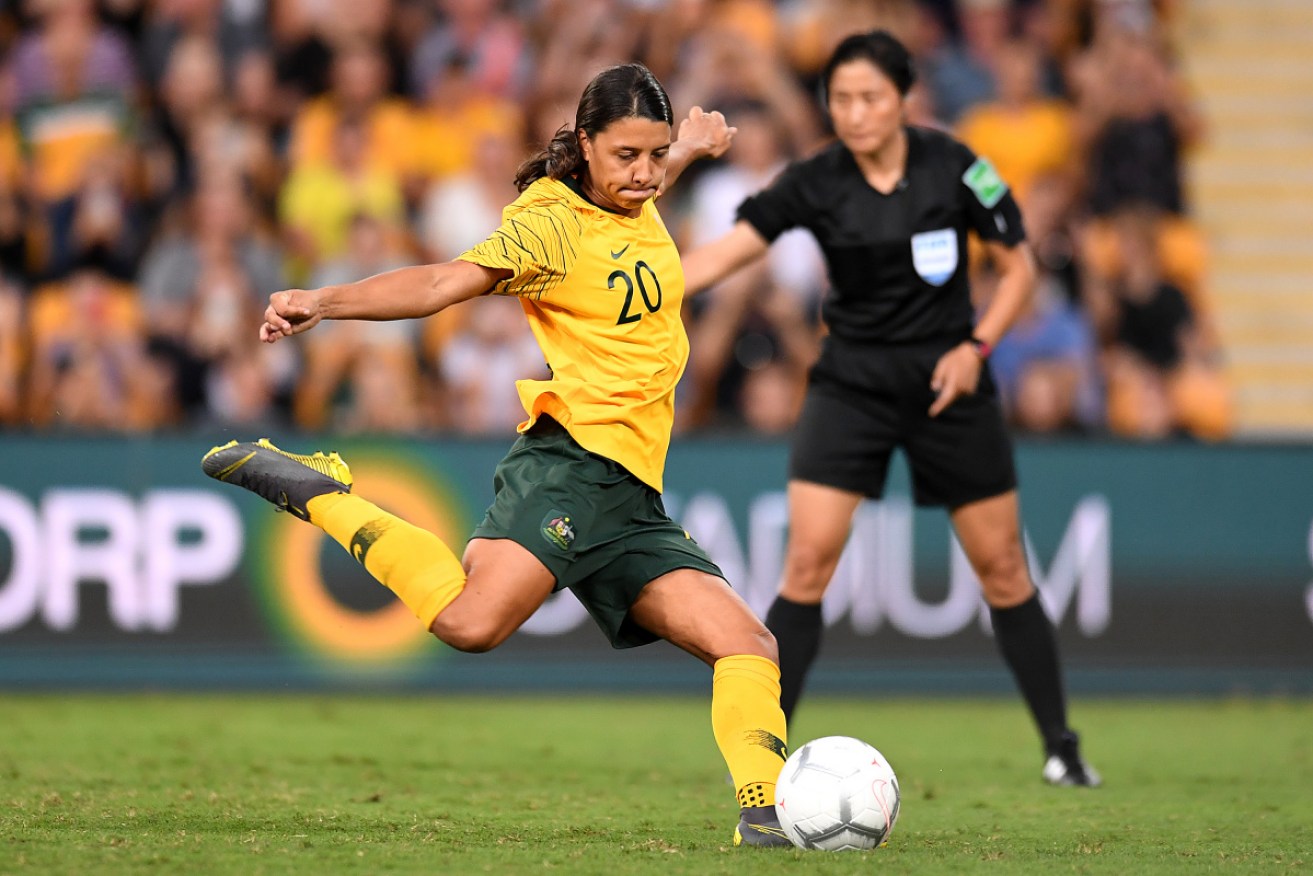 Australian captain Sam Kerr opens the scoring with her first-half penalty. 