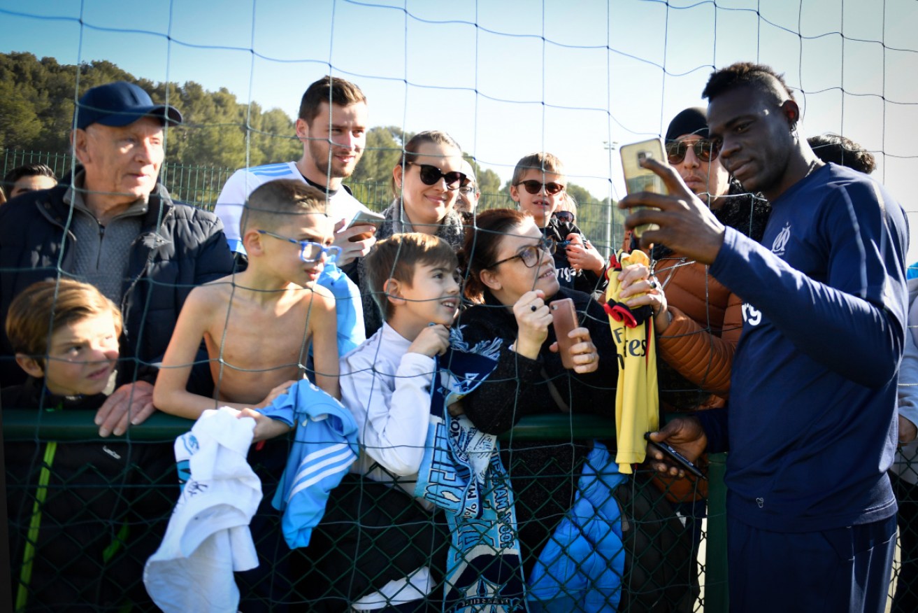 Marseille's Mario Balotelli is well known for his fan interactions. 