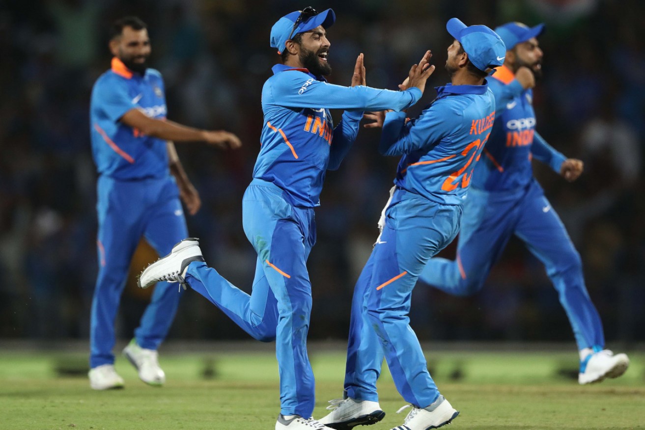 India celebrate after they defeated Australia during game two of the One Day International series between India and Australia. 