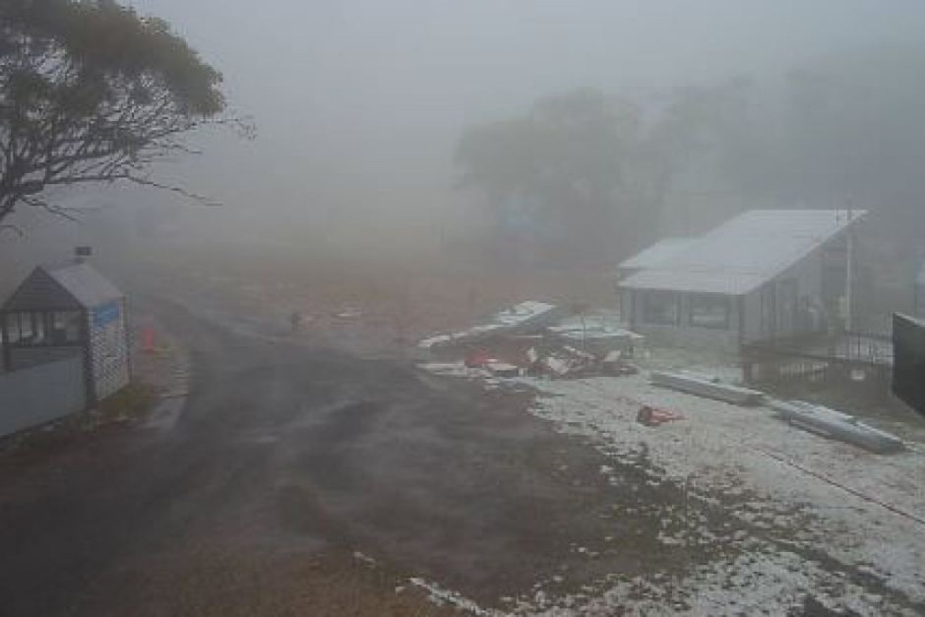 Snow was clearly visible at Mount Baw Baw Ski Bowl just days after the bushfire evacuation.

