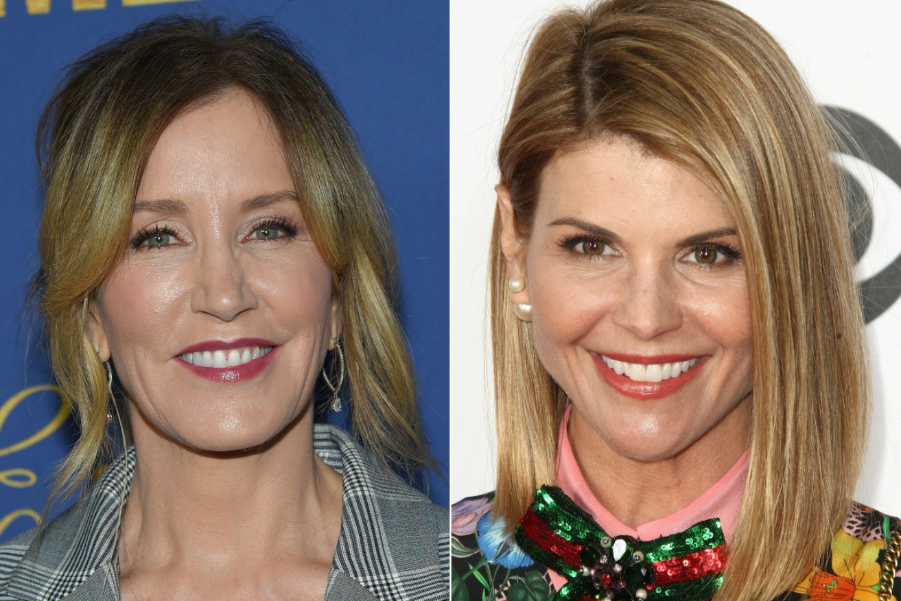 Felicity Huffman(L)  and Lori Loughlin are among 50 people indicted in a nationwide university admissions scam.