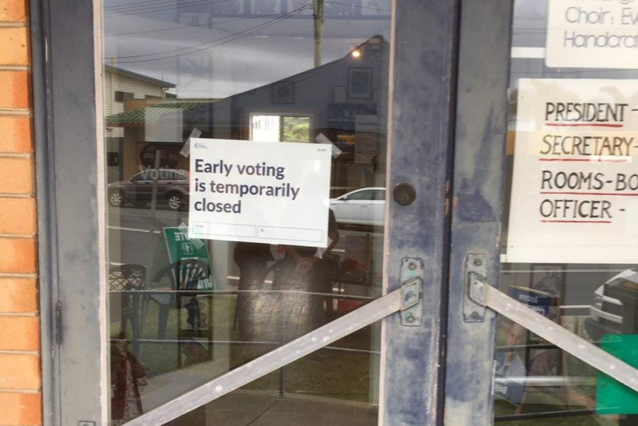 A sign on the door of a closed pre-polling booth on Wednesday.