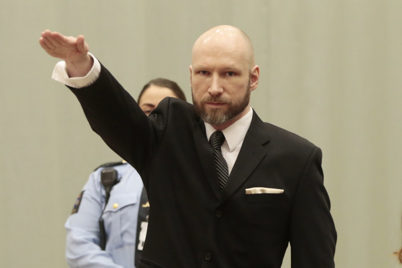 Anders Breivik displayed his relentless evil by flashing a Nazi salute at his latest unsuccessful parole hearing. <i>Photo: AAP</i>