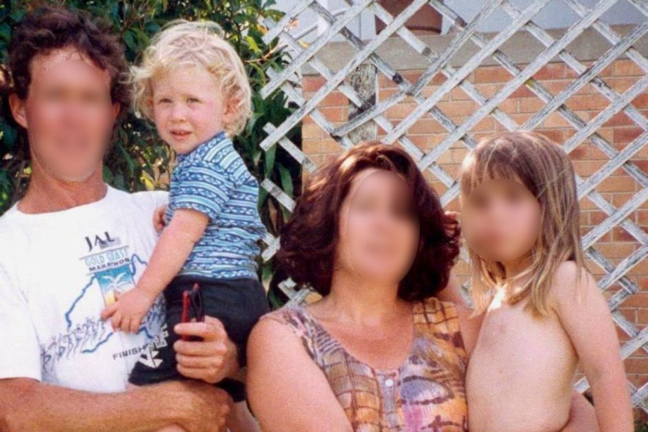 A photo of the Tarrant family showing Brenton in his late father's arms. Photo: ABC News