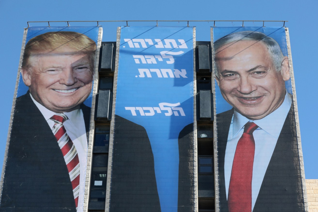 Mr Trump and Mr Netanyahu together on an election campaign billboard in February.