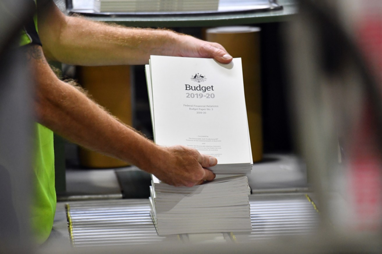 The budget documents are printed and ready for Tuesday night.