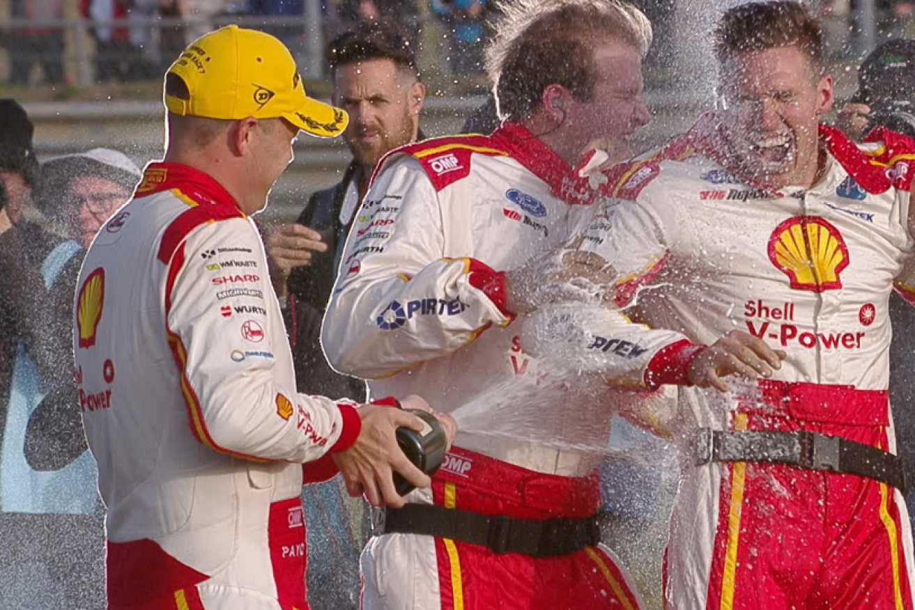 It's the sweet taste of victory and a champagne shower for Scott McLaughlin and teammates.