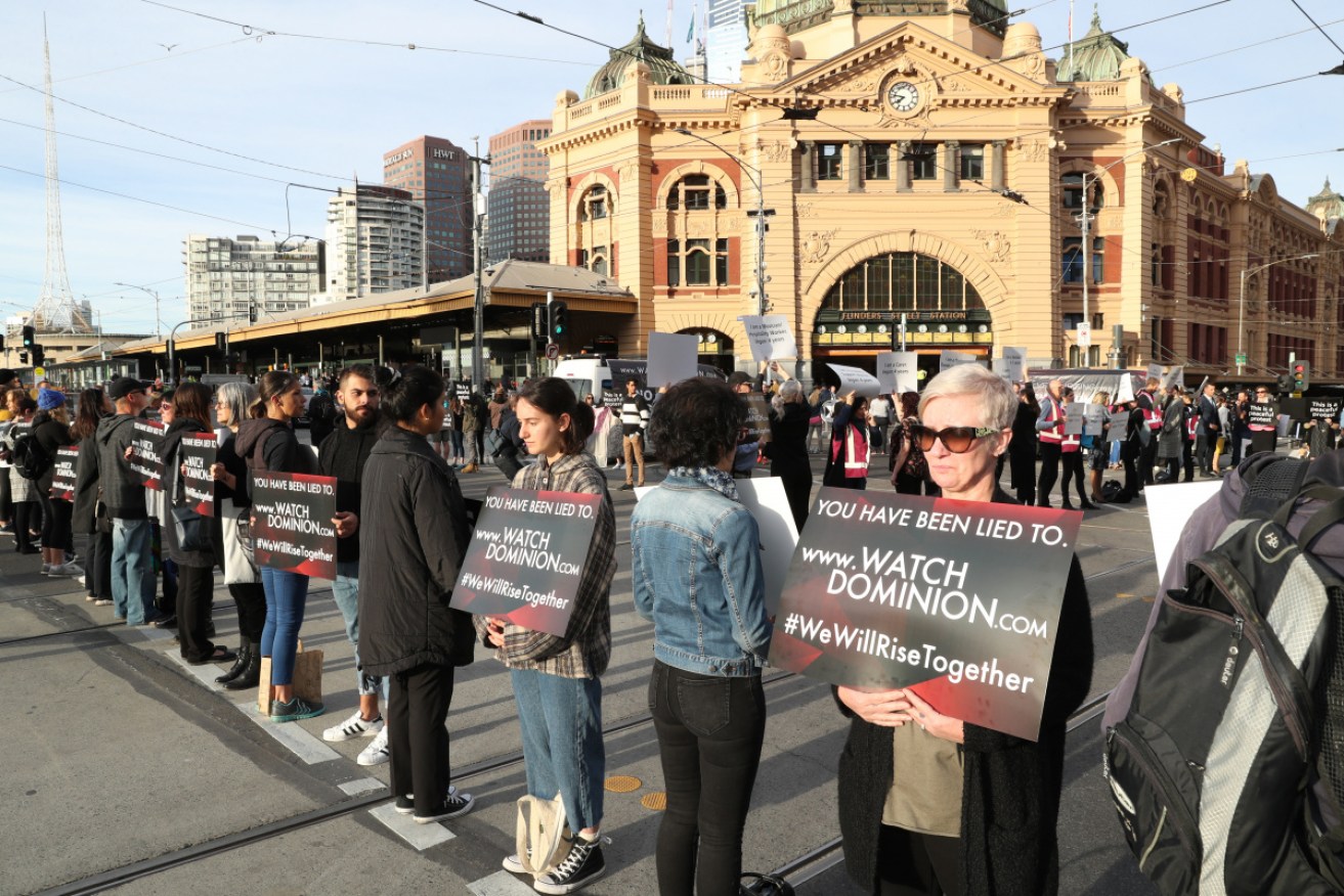 Animal rights activists brought traffic to a halt in Melbourne's CBD on Monday. 