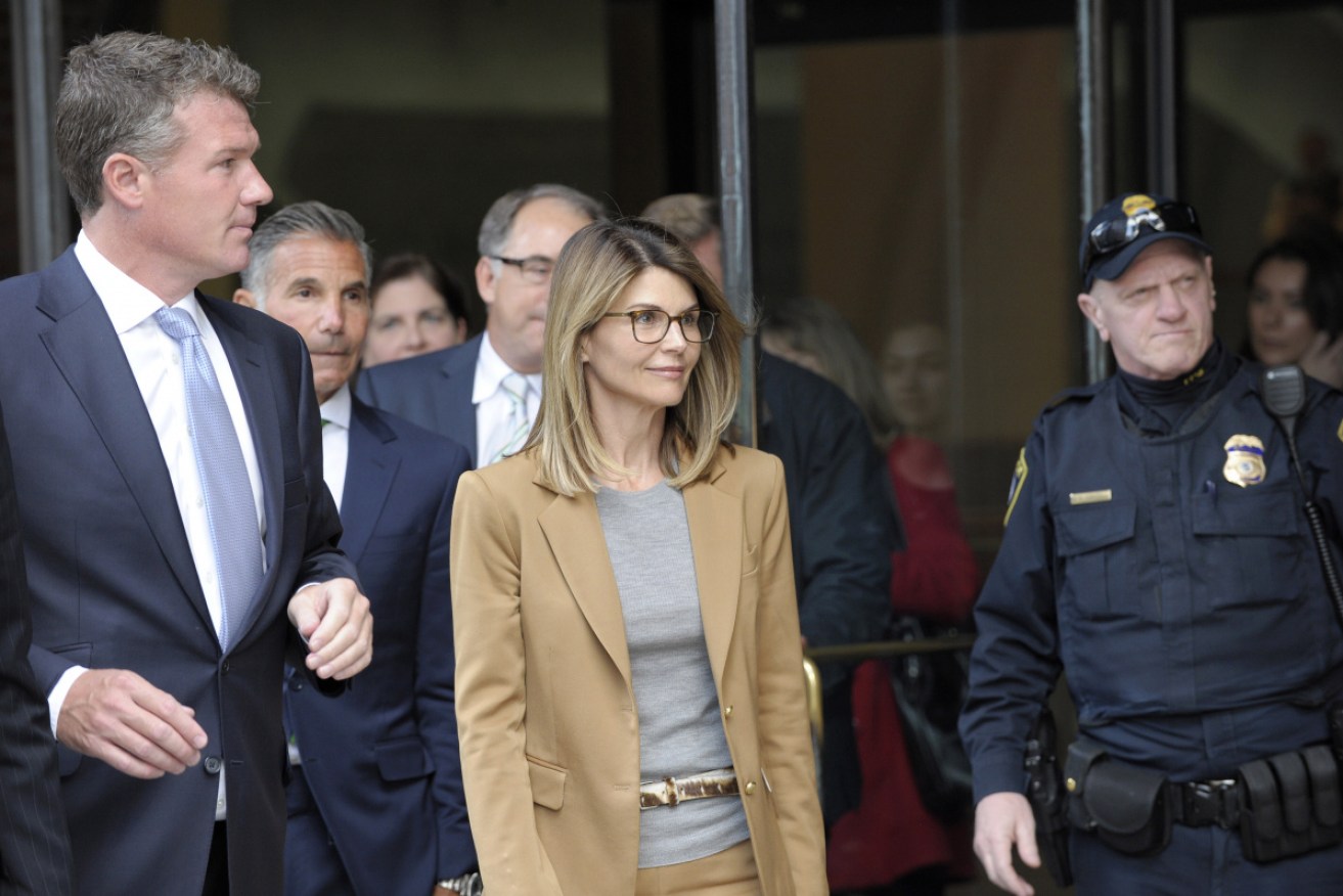 Actress Lori Loughlin was also charged but did not plead guilty. 