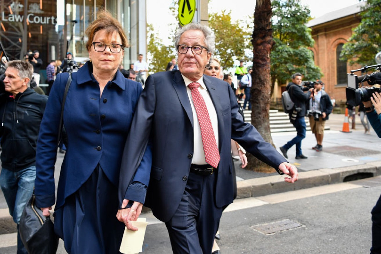 Geoffrey Rush and wife Jane Menelaus leave the NSW Supreme Court on April 11.