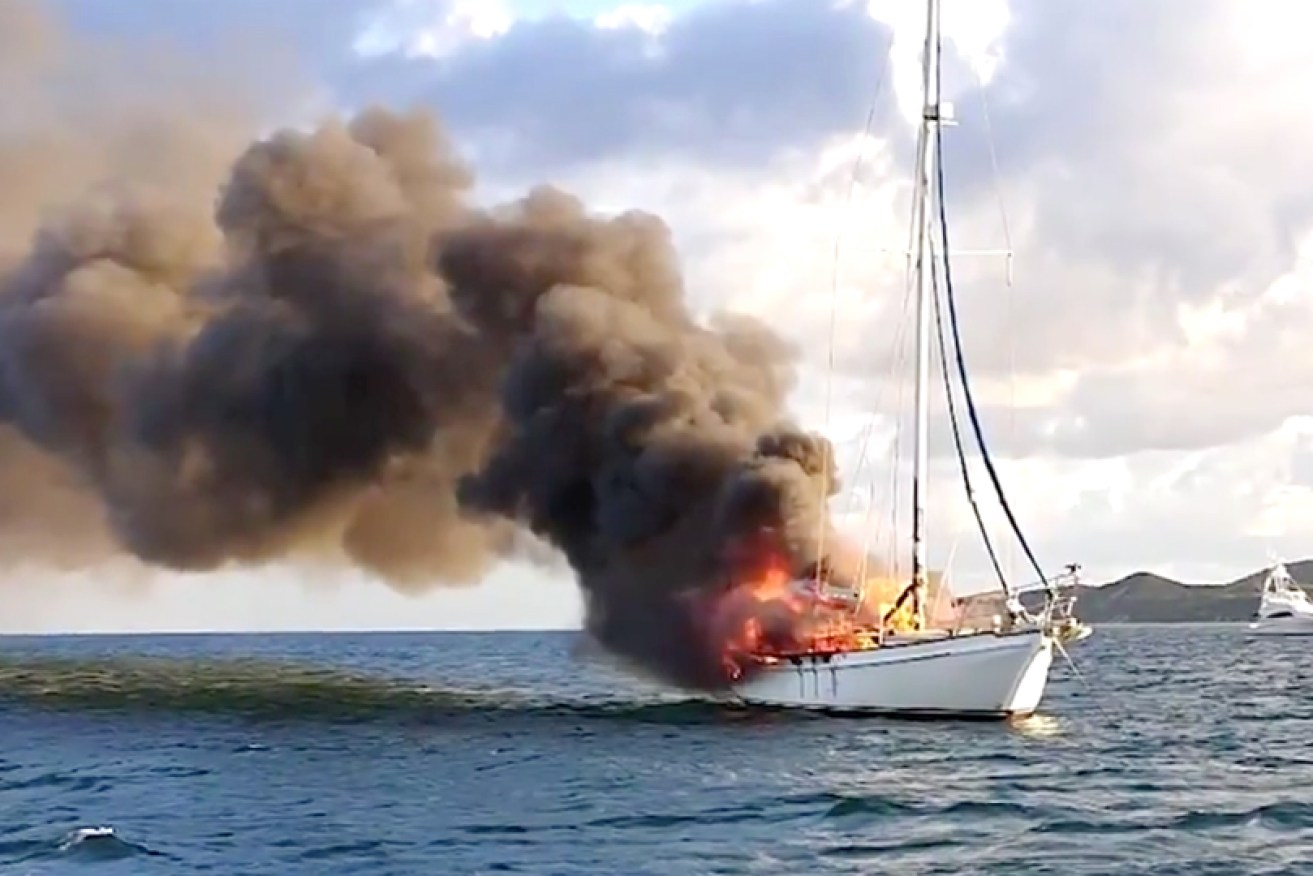 Police say the trio were lucky to escape the burning yacht.
