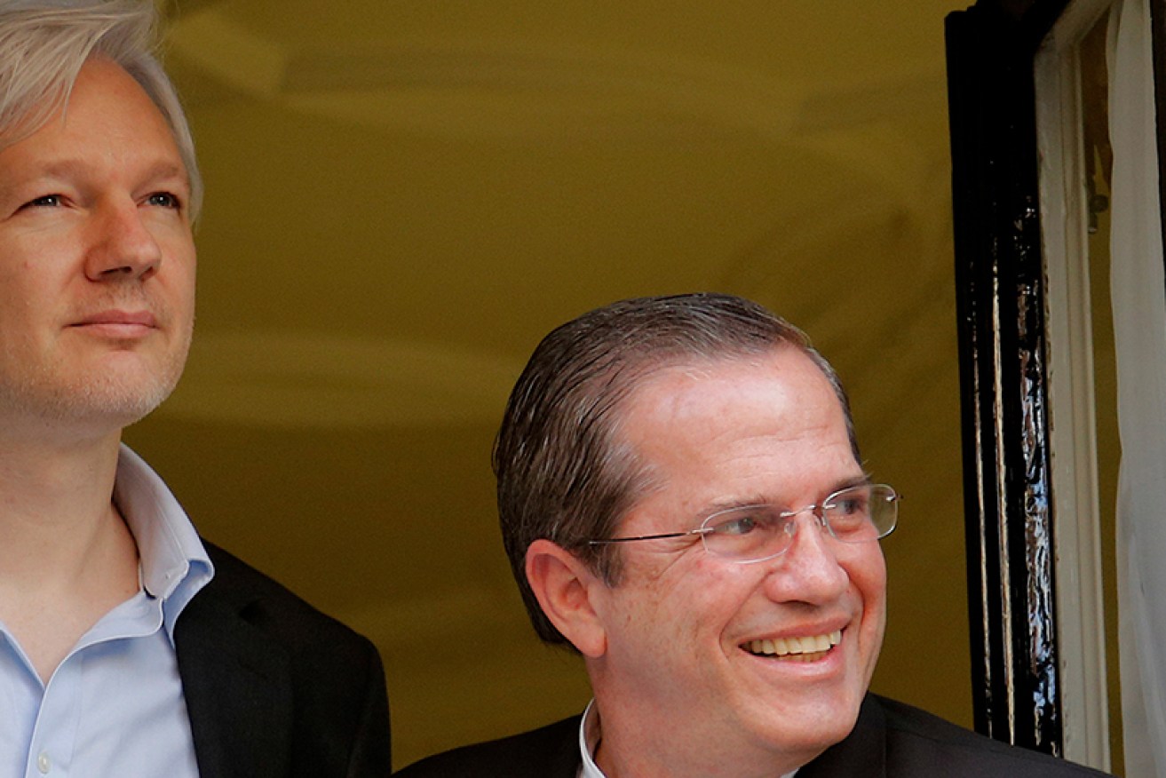 Assange with Ecuadorian Foreign Minister Ricardo Patino (R) at the  Ecuadorian embassy in central London in June 2013.